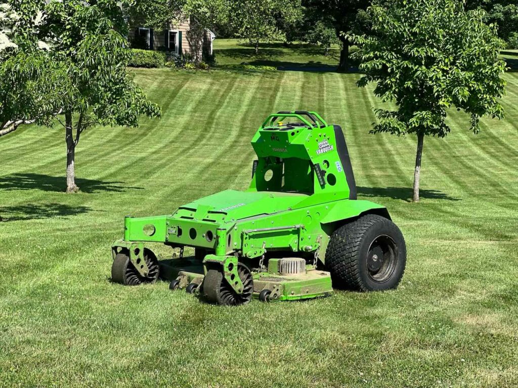 Electric lawn mowing service maintaining residential lawn in Greenland NH