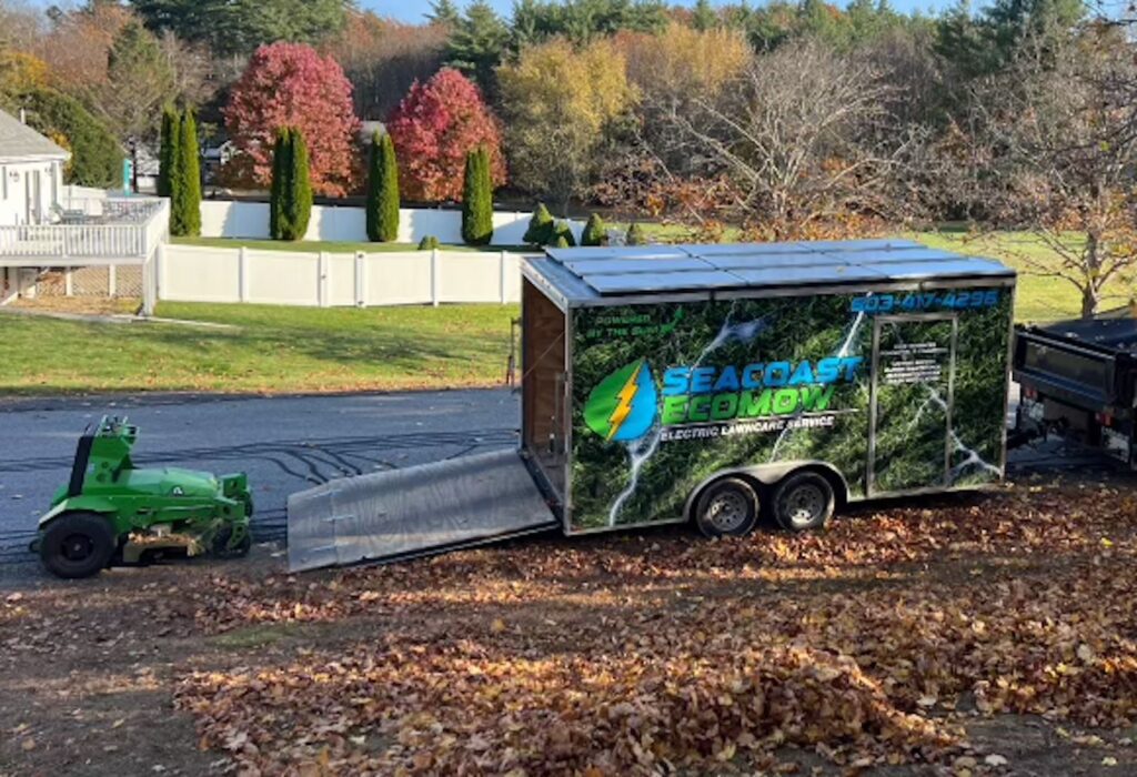 Seacoast EcoMow electric lawn care truck and equipment during fall cleanup in Newington NH